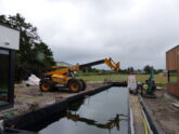 Bosch Beton - Natuurlijke zwemvijver van keerwanden in Noordwijkerhout